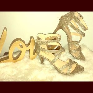 Strappy gold high heels